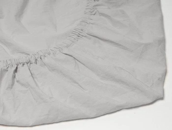 Adjustable Pillows for Customized ComfortOrganic Crinkled Percale Crib Sheet